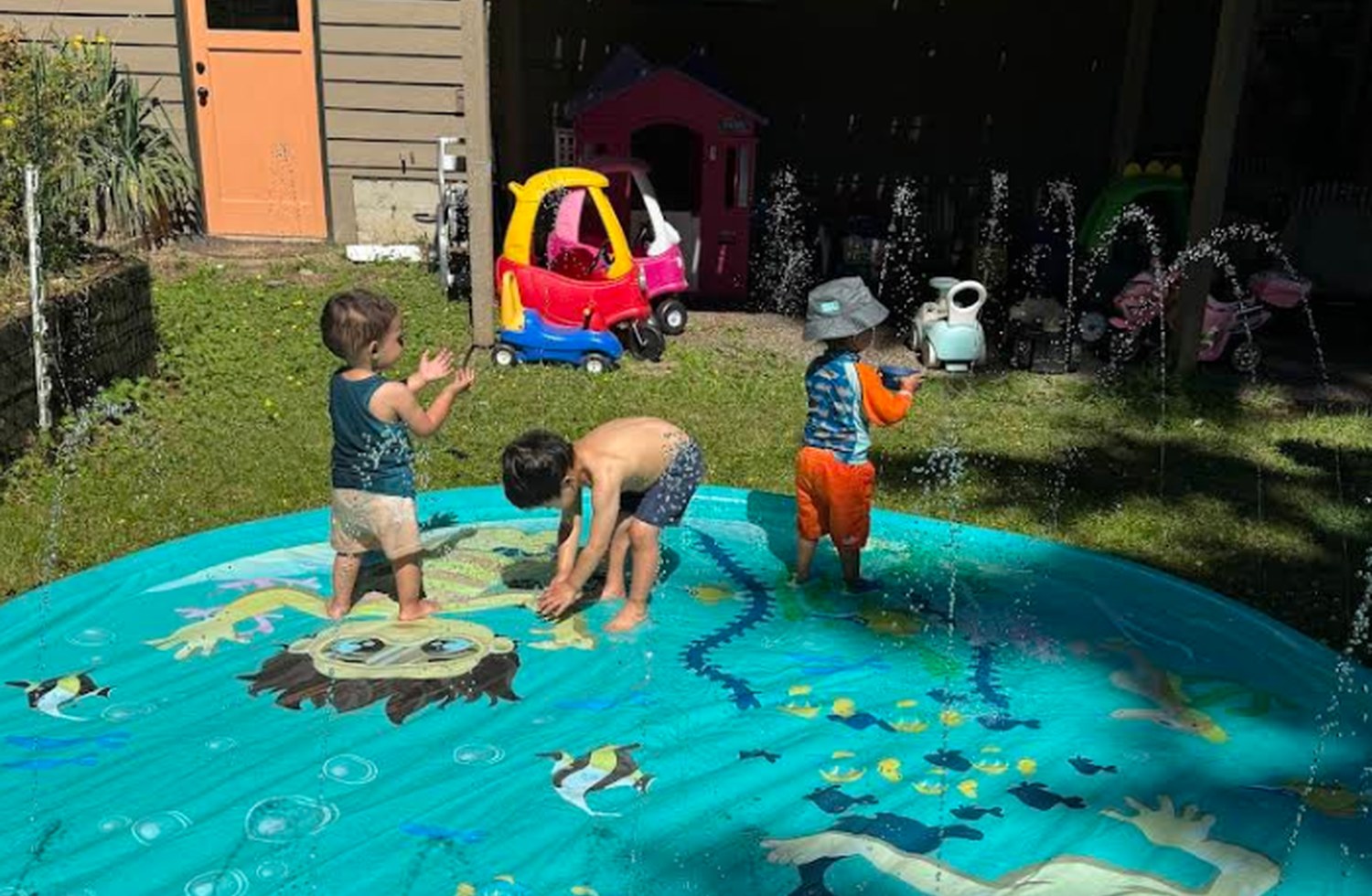 Children enjoying outdoor water play